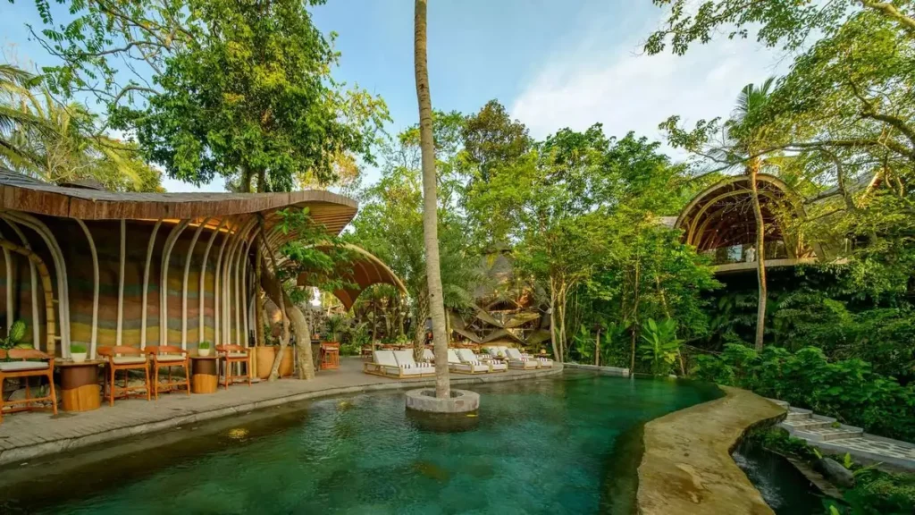 A luxurious eco-resort nestled in a pristine natural setting, exemplifying sustainable luxury travel.